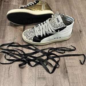 Black and White High-Top Sneakers with Gold Accent